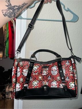 Ed Hardy Red and Black Skull-Print Satchel with Stud Accents
